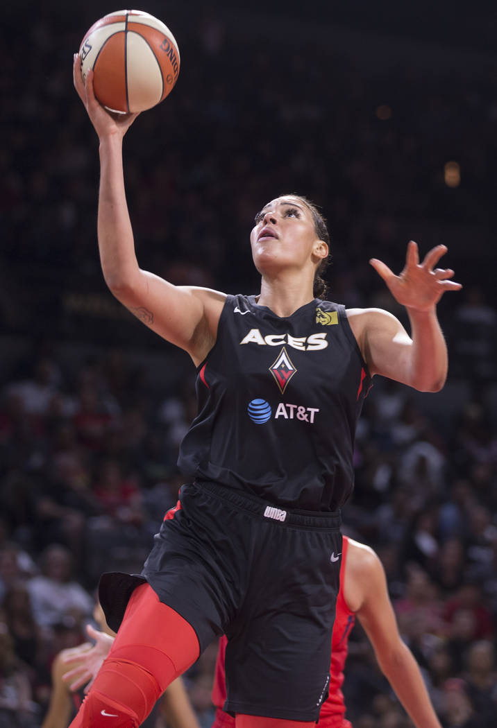 Las Vegas Aces center Liz Cambage (8) drives to the basket in the third quarter of Vegas' WNBA ...