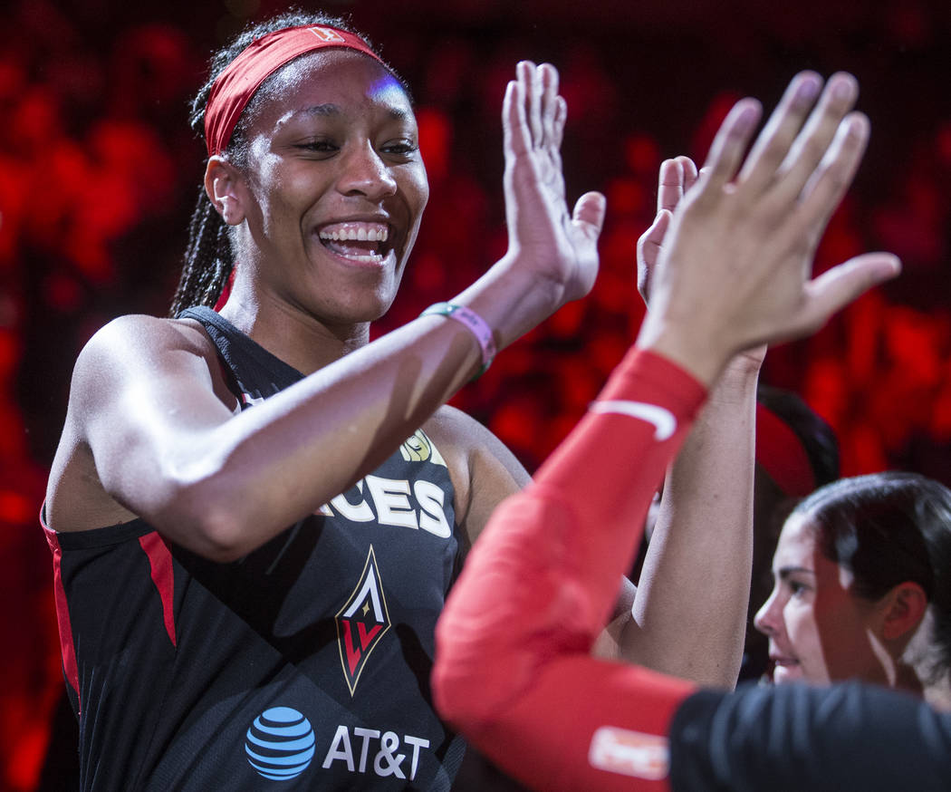 Las Vegas Aces center A'ja Wilson (22) gets fired up with teammates before the start of Vegas' ...