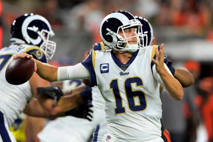 Los Angeles Rams quarterback Jared Goff throws during the first half of an NFL football game ag ...