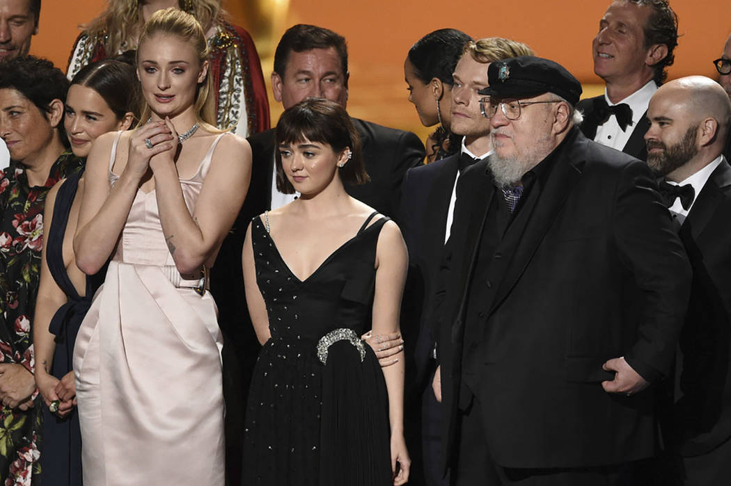Emilia Clarke, from left, Sophie Turner, Maisie Williams, Alfie Allen, George R. R. Martin and ...