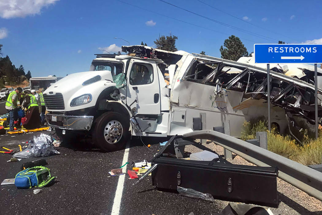 This photo shows a tour bus that was carrying Chinese-speaking tourists after it crashed near B ...