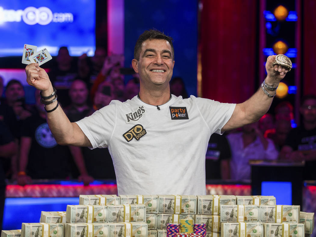 Hossein Ensan, from Germany, celebrates after winning the World Series of Poker Main Event on W ...