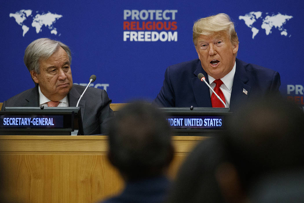 United Nations Secretary General Antonio Guterres listens as President Donald Trump speaks at a ...