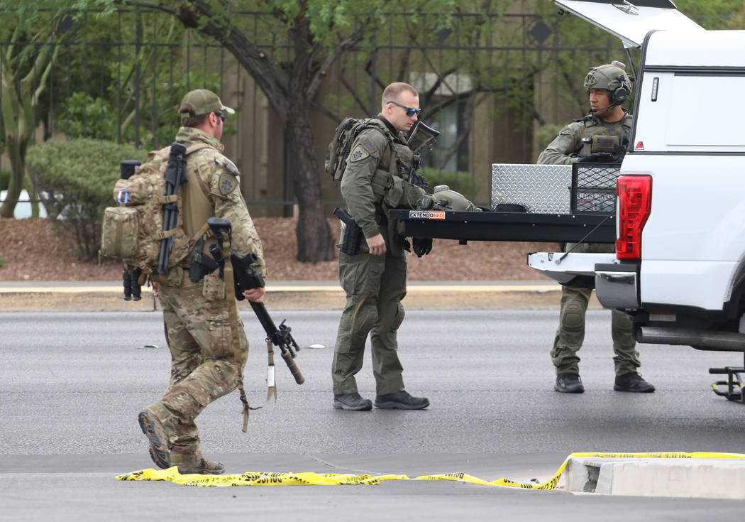 Metro SWAT unit arrive where Las Vegas police responded to an attempted robbery that turned int ...