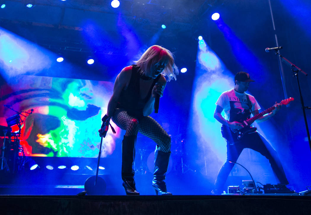 Sarah Barthel, left, and Josh Carter, of Phantogram, perform at the Huntridge stage during day ...