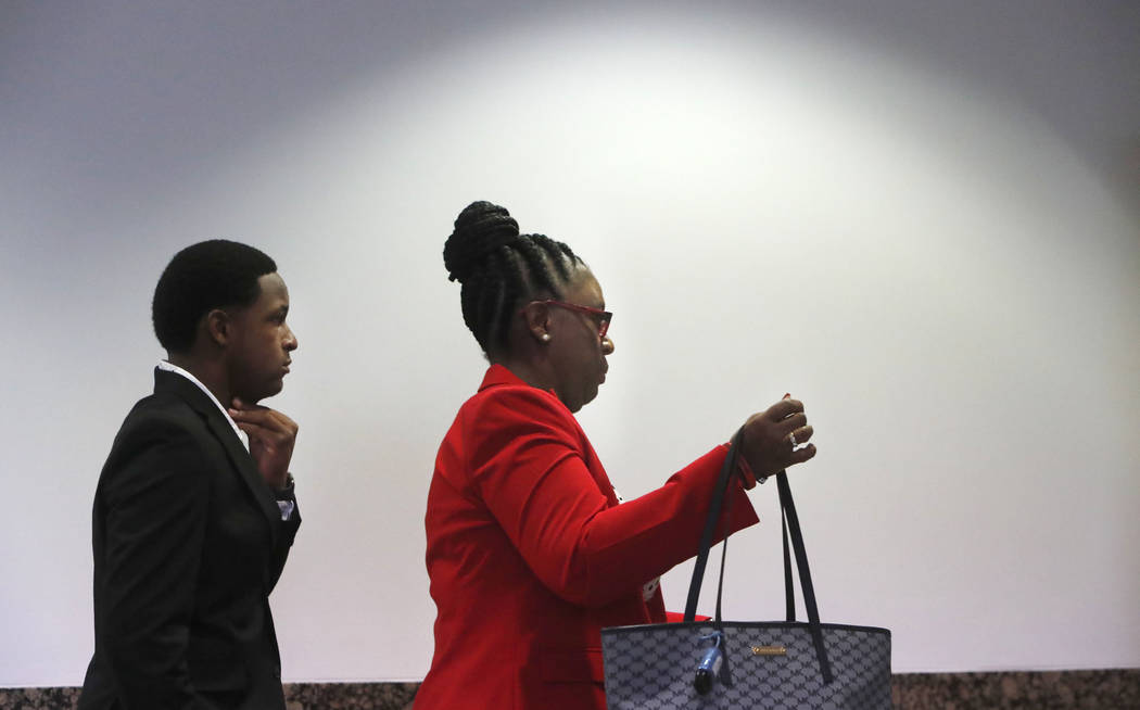 Allison Jean, right, the mother of Botham Jean and Botham's brother Brandt Jean arrive for the ...