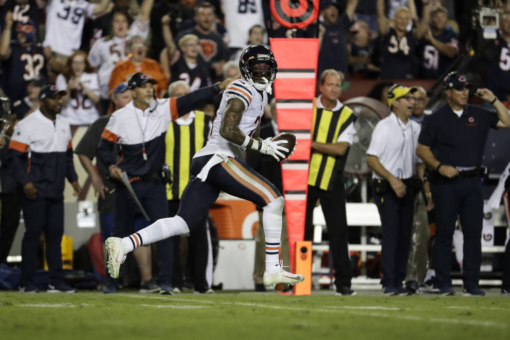 Chicago Bears strong safety Ha Ha Clinton-Dix (21) runs with his interception during the second ...