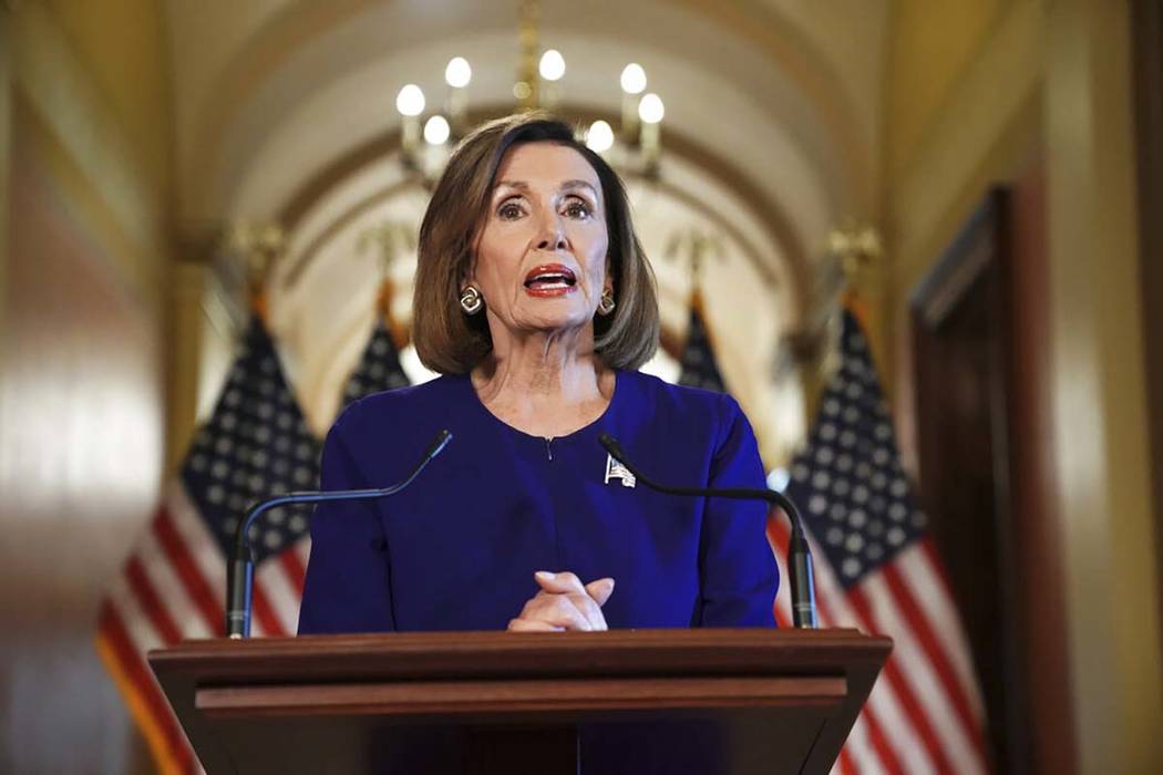 House Speaker Nancy Pelosi of Calif., reads a statement announcing a formal impeachment inquiry ...