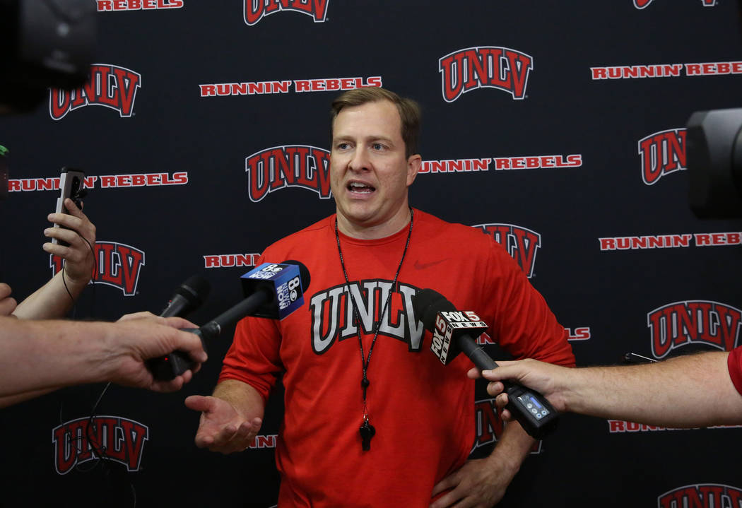 UNLV Rebels head coach T.J. Otzelberger, talks to the media after team's first basketball pract ...