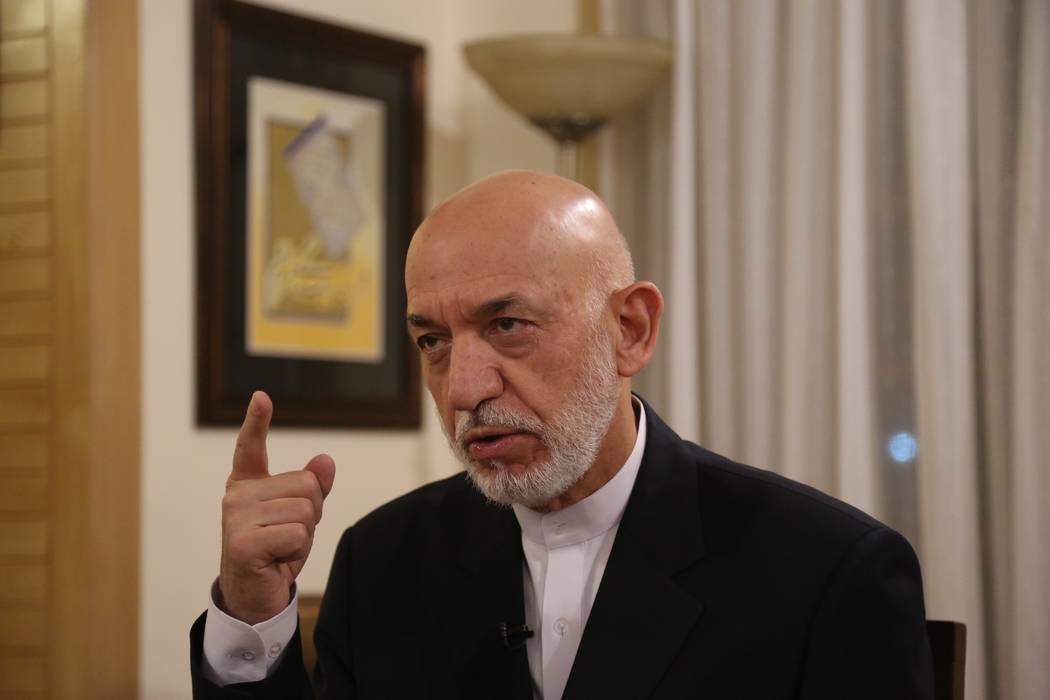 Former President Hamid Karzai speaks during an interview in Kabul, Afghanistan, Tuesday, Sept. ...