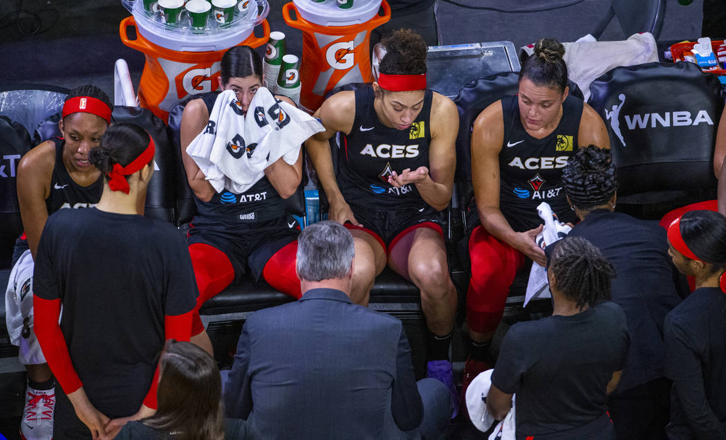 Las Vegas Aces players take a break during a timeout versus the Washington Mystics during the f ...