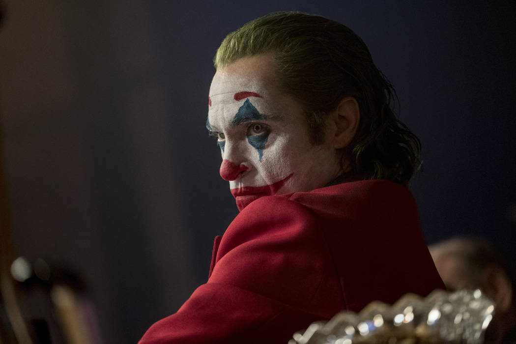 This image released by Warner Bros. Pictures shows Joaquin Phoenix in a scene from "Joker, ...