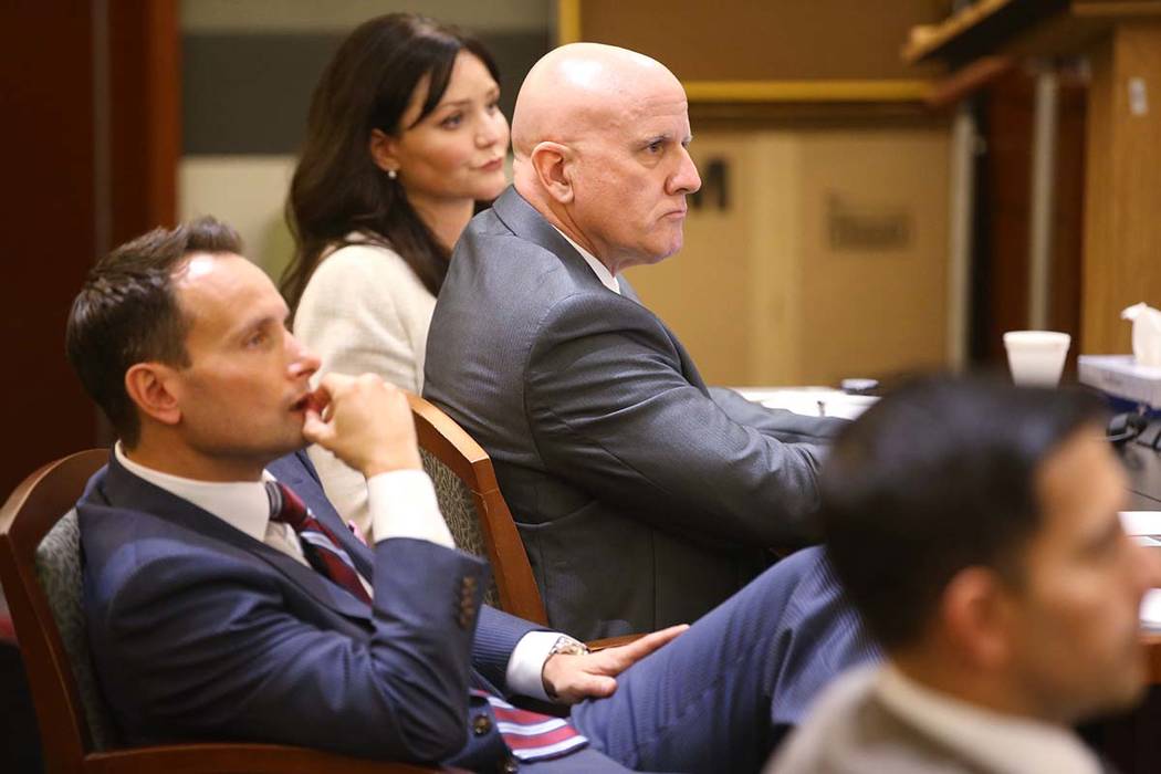 Las Vegas police Lt. James "Tom" Melton, third from left, listens to closing argument ...