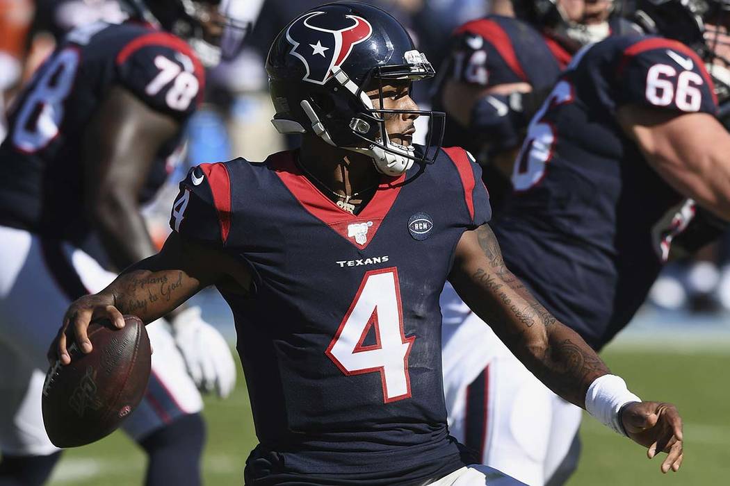 Houston Texans quarterback Deshaun Watson (4) throws a pass during an NFL football game against ...