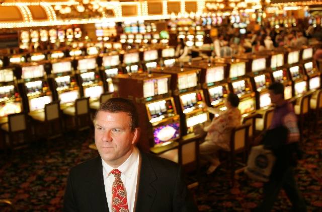 Tilman Fertitta, shown inside the Golden Nugget in Las Vegas, is expanding his business empire ...