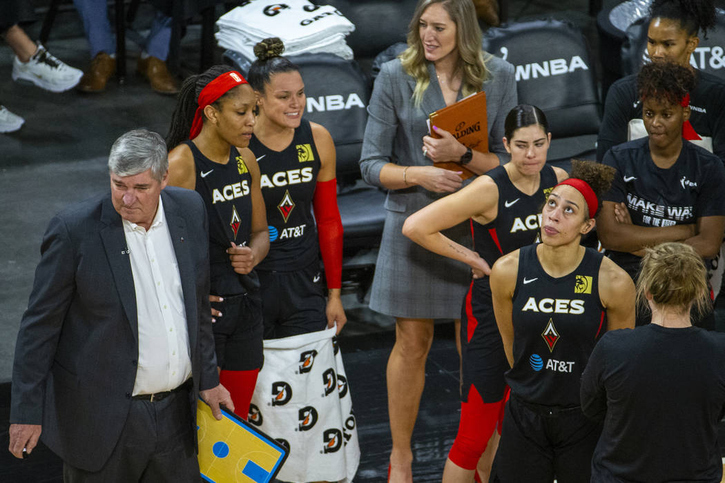 The Las Vegas Aces look dejected as they are down late versus the Washington Mystics during the ...