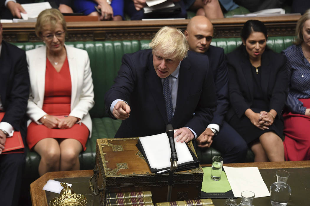 In this handout photo provided by the House of Commons, Britain's Prime Minister Boris Johnson ...