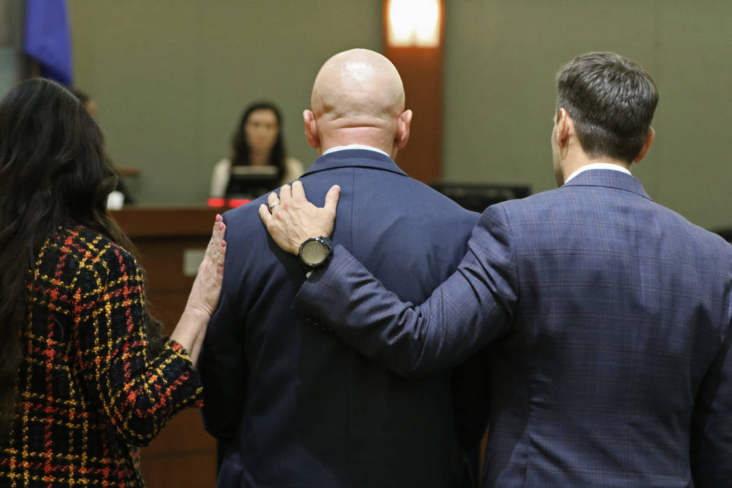 Defense attorney Jean Schwartzer, left, Las Vegas police Lt. James "Tom" Melton and d ...