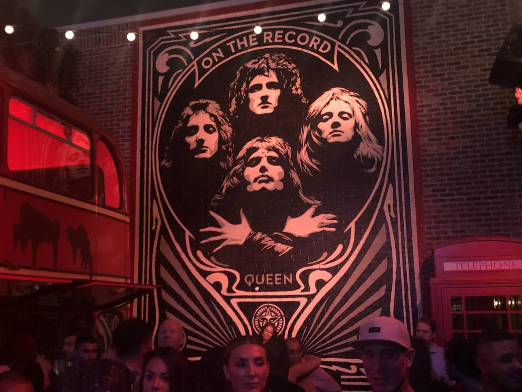 Pop artist Shepard Fairey's latest piece, an homage to Queen, is shown at On The Record at Park ...