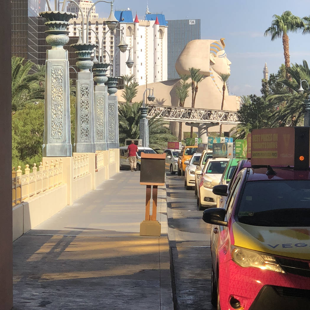 Taxis are lined up outside Mandalay Bay on the Las Vegas Strip on Monday, Oct. 1, 2018. Todd Pr ...