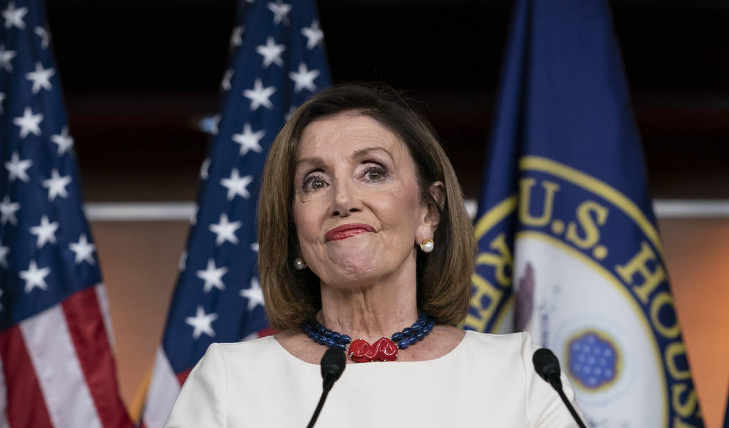 Speaker of the House Nancy Pelosi, D-Calif., addresses reporters at the Capitol in Washington, ...