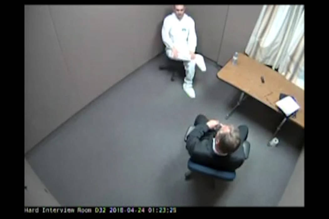 Alek Minassian, top, is seen during a police interview in a still frame taken from handout vide ...