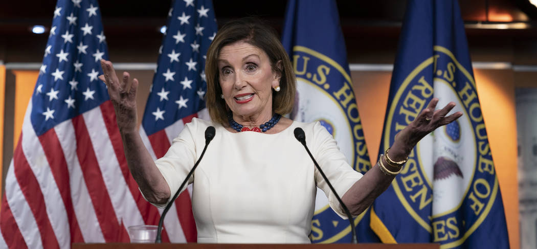 Speaker of the House Nancy Pelosi, D-Calif., addresses reporters at the Capitol in Washington, ...