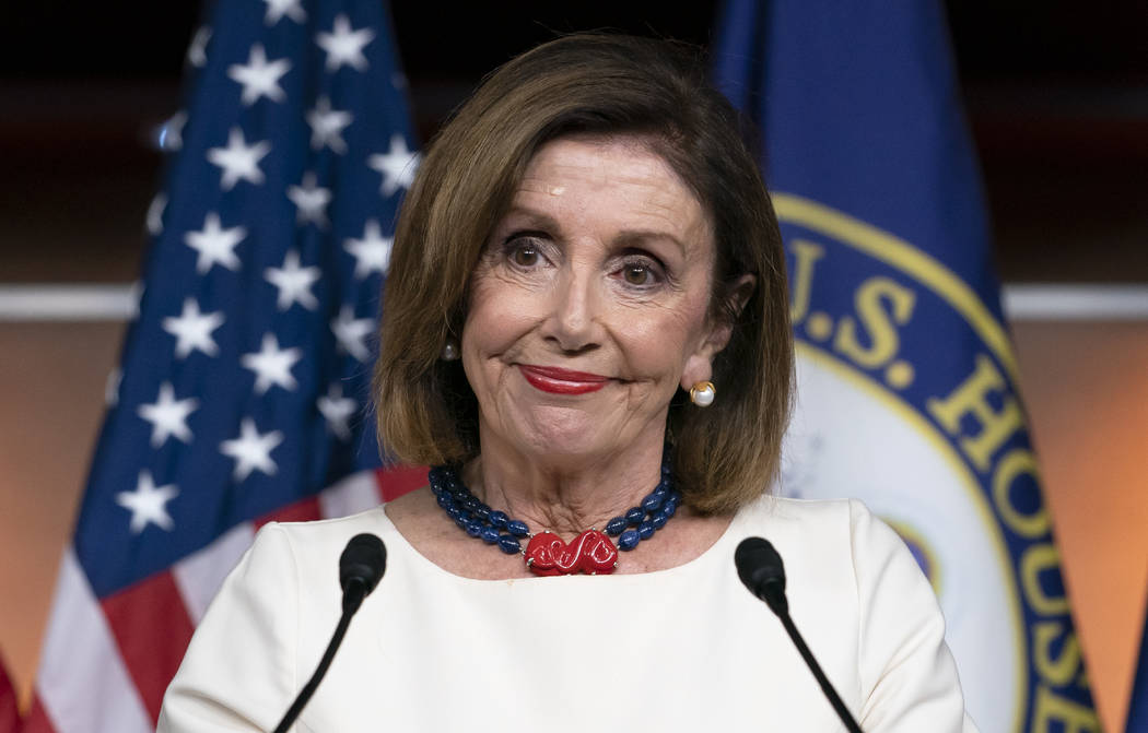 Speaker of the House Nancy Pelosi, D-Calif., addresses reporters at the Capitol in Washington, ...