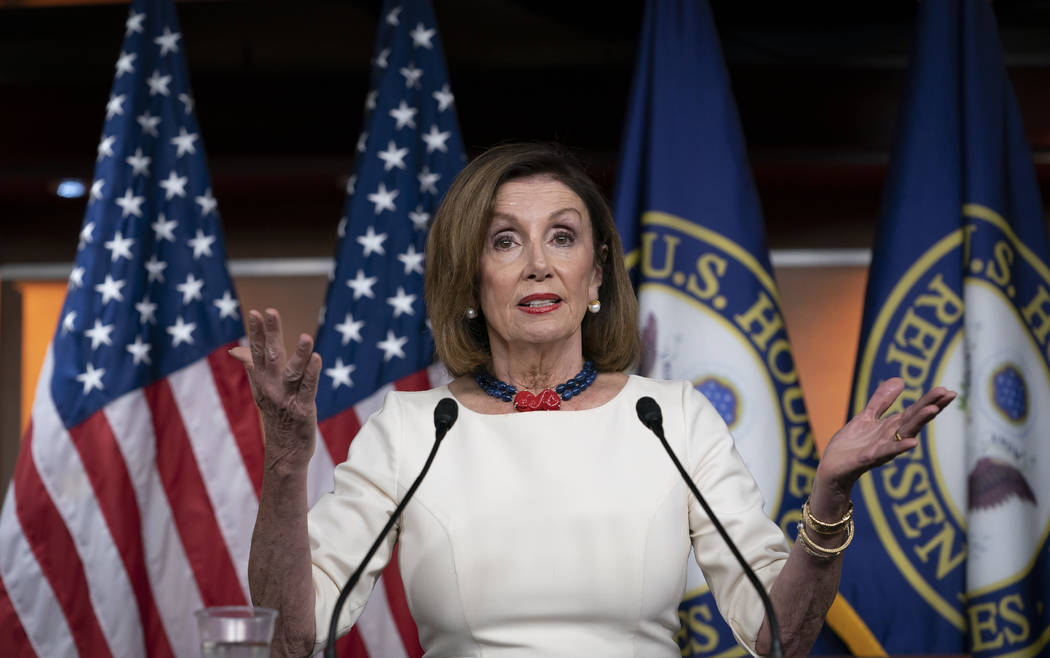 Speaker of the House Nancy Pelosi, D-Calif., addresses reporters at the Capitol in Washington, ...