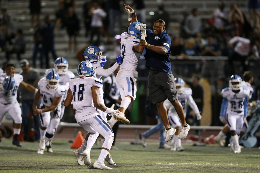 Centennial celebrates their 17-14 win against Arbor View in the football game at Arbor View Hig ...