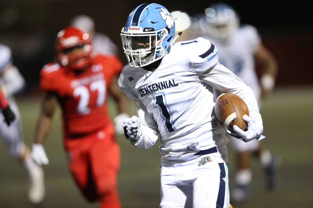 Centennial's Jordan Smith (1) runs for a touchdown against Arbor View during the fourth quarter ...