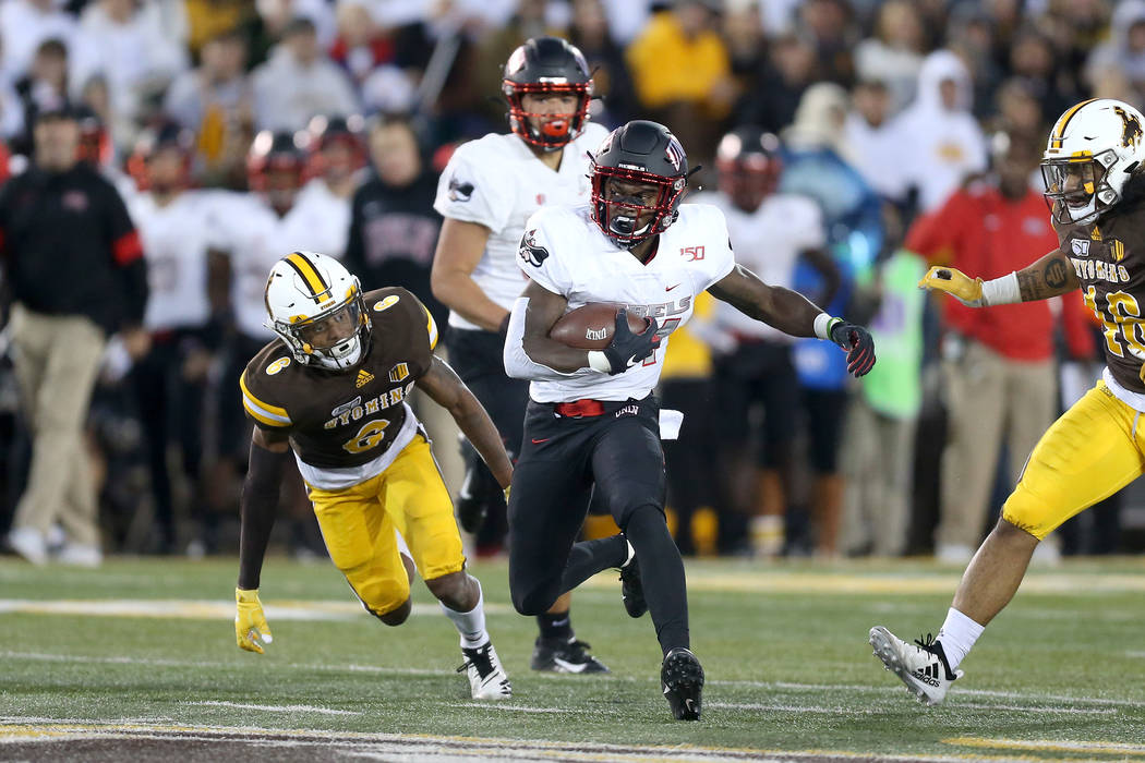 UNLV running back Darren Williams cuts upfield during the Mountain West game against the Univer ...