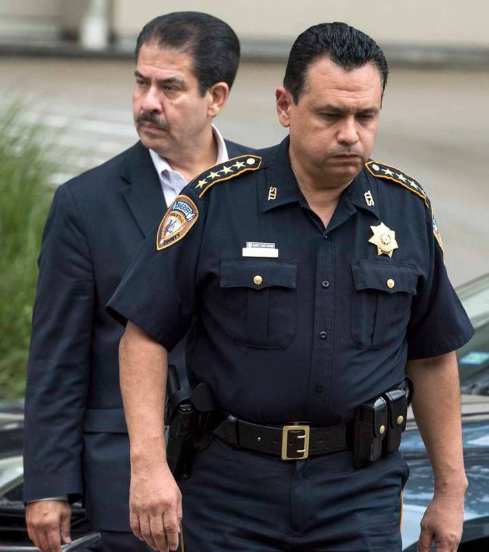 Harris County Sheriff Ed Gonzalez and Adrian Garcia walk outside Memorial Hermann Hospital afte ...