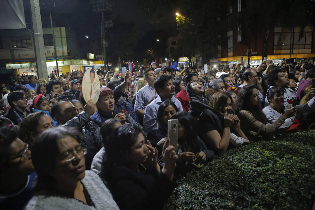 Fans gather to sing and remember Jose Jose while mourning his death at Jose Jose's statue in Me ...