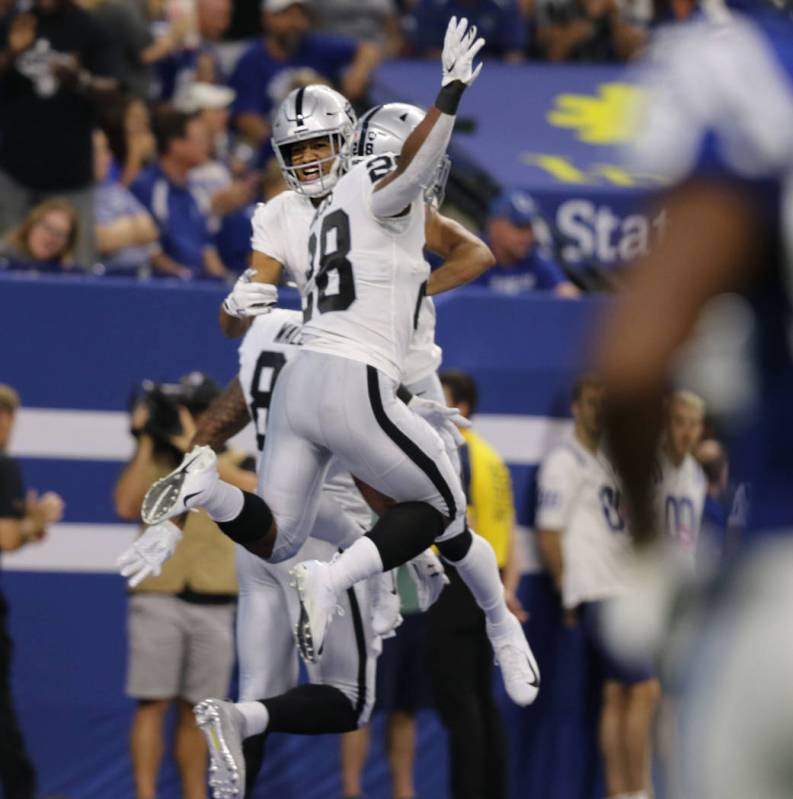 Oakland Raiders Trevor Davis (11) celebrates his touchdown with running back Josh Jacobs (28) d ...