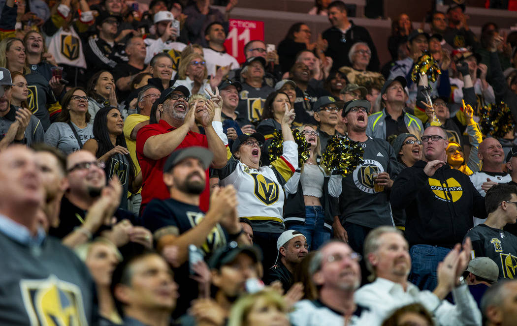 Vegas Golden Knights fans celebrate another goal over the San Jose Sharks during the second per ...