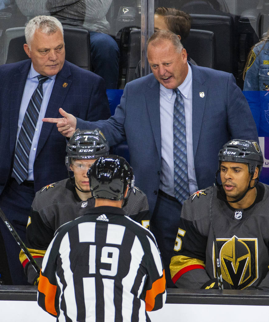 Vegas Golden Knights head coach Gerard Gallant argues with the referee after another fight on t ...