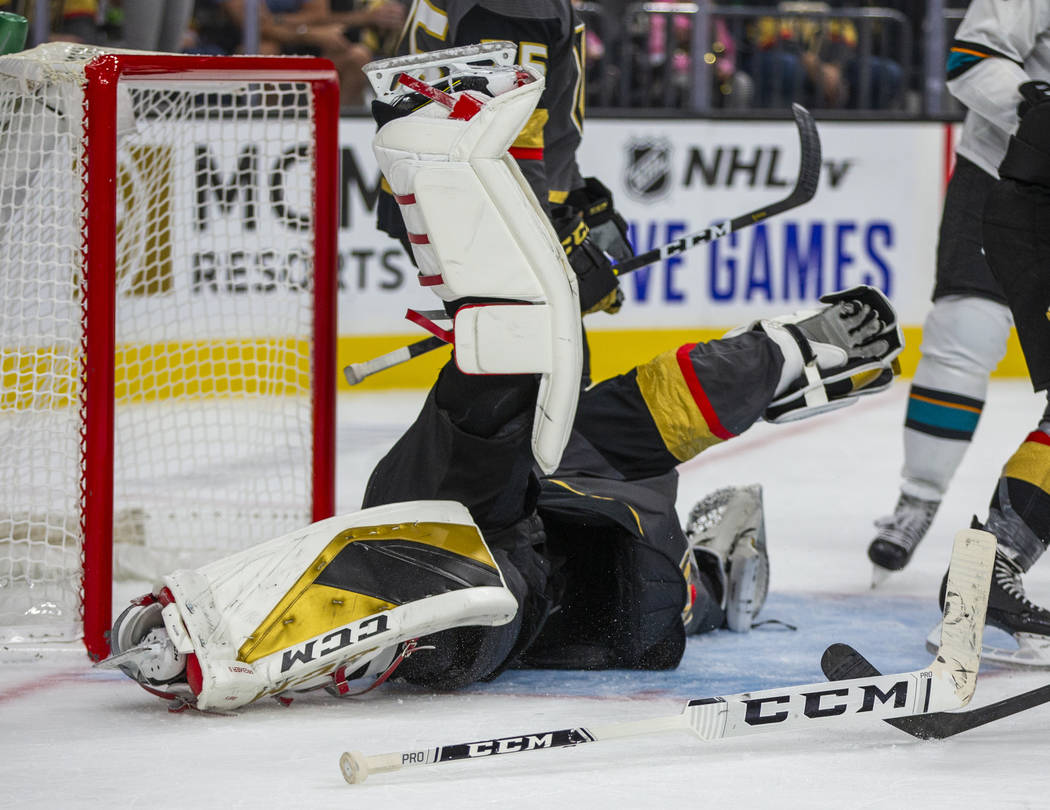 Vegas Golden Knights goaltender Marc-Andre Fleury (29) makes a save but loses his stick versus ...