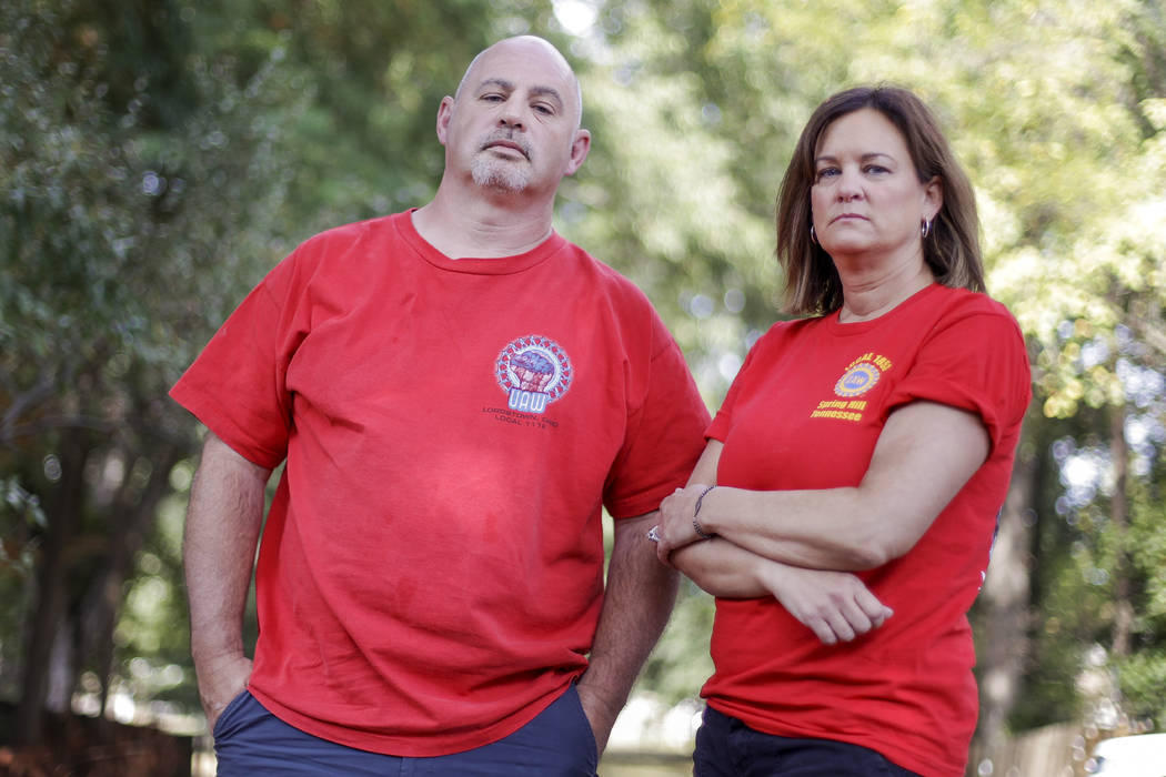 This Sept. 20, 2019, photo, shows General Motors workers Matt Himes and Tammy Hudak in Spring H ...