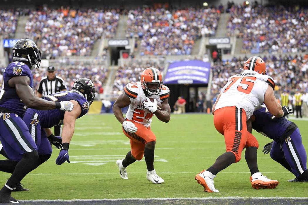 Cleveland Browns running back Nick Chubb (24) runs for one of his three rushing touchdowns agai ...