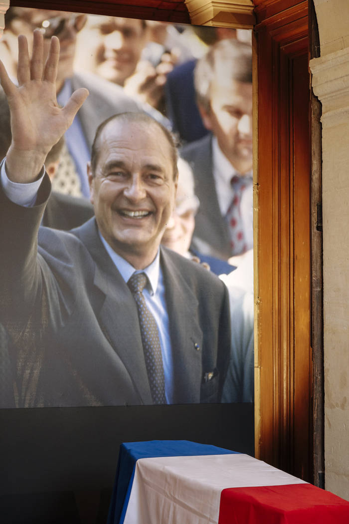 The coffin of former French President Jacques Chirac is seen Sunday, Sept. 29, 2019 at the Inva ...