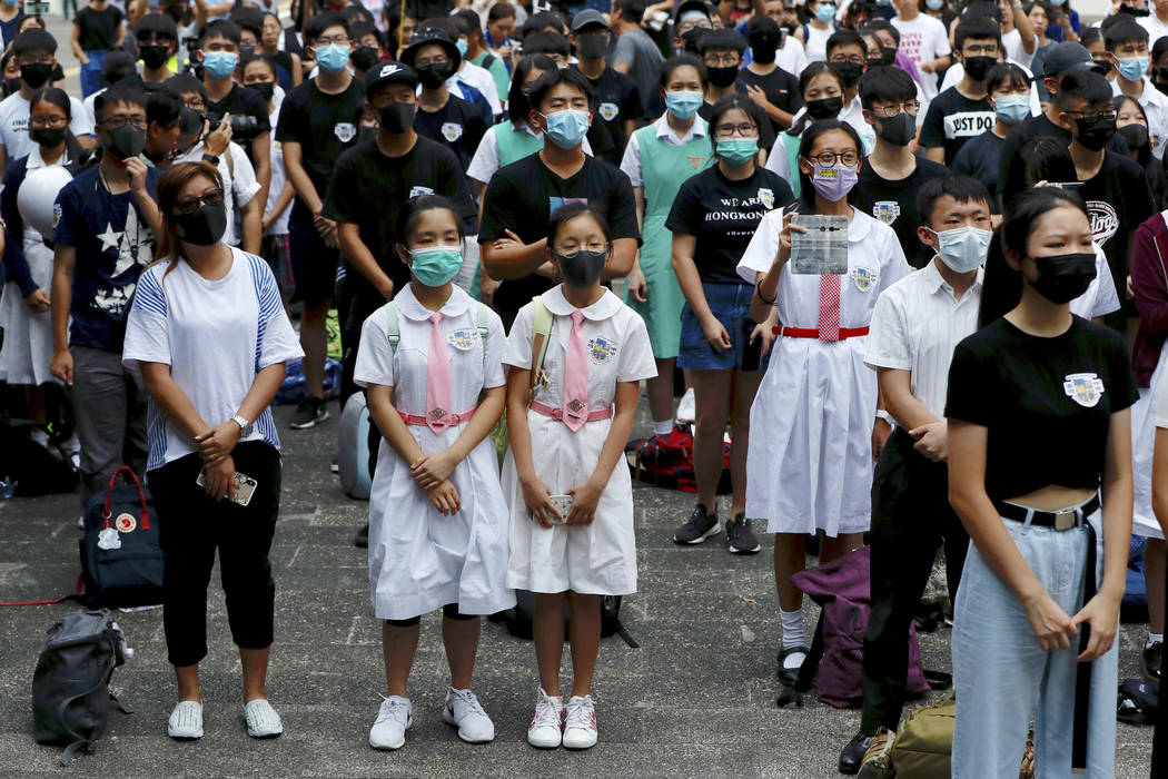 Students gather during a school children's strike event in support of protest movement in Hong ...
