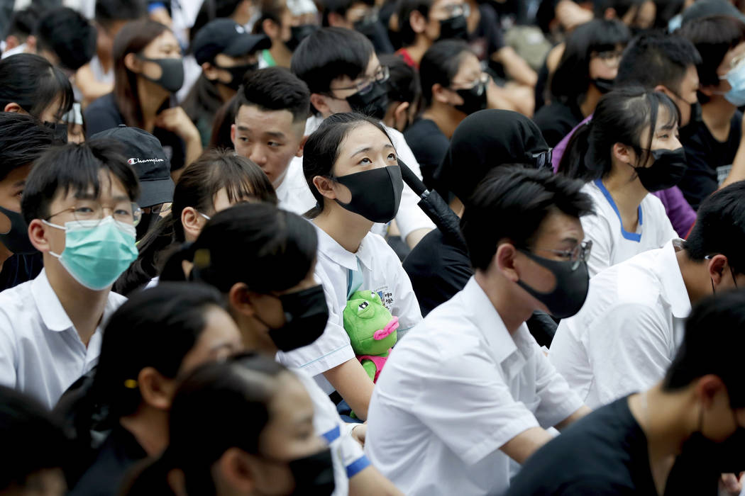 Students gather during a school children's strike event in support of protest movement in Hong ...