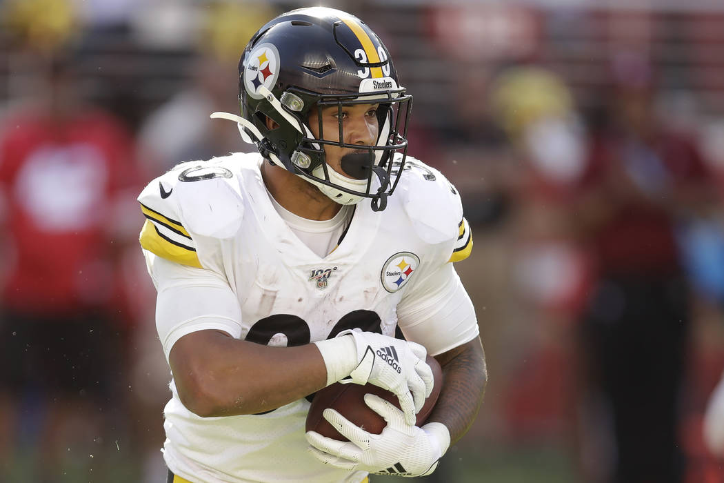 Pittsburgh Steelers running back James Conner (30) runs against the San Francisco 49ers during ...