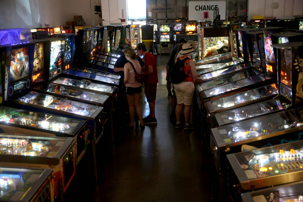 People play pinball machines at the Pinball Hall of Fame at 1610 E. Tropicana Ave. in Las Vegas ...