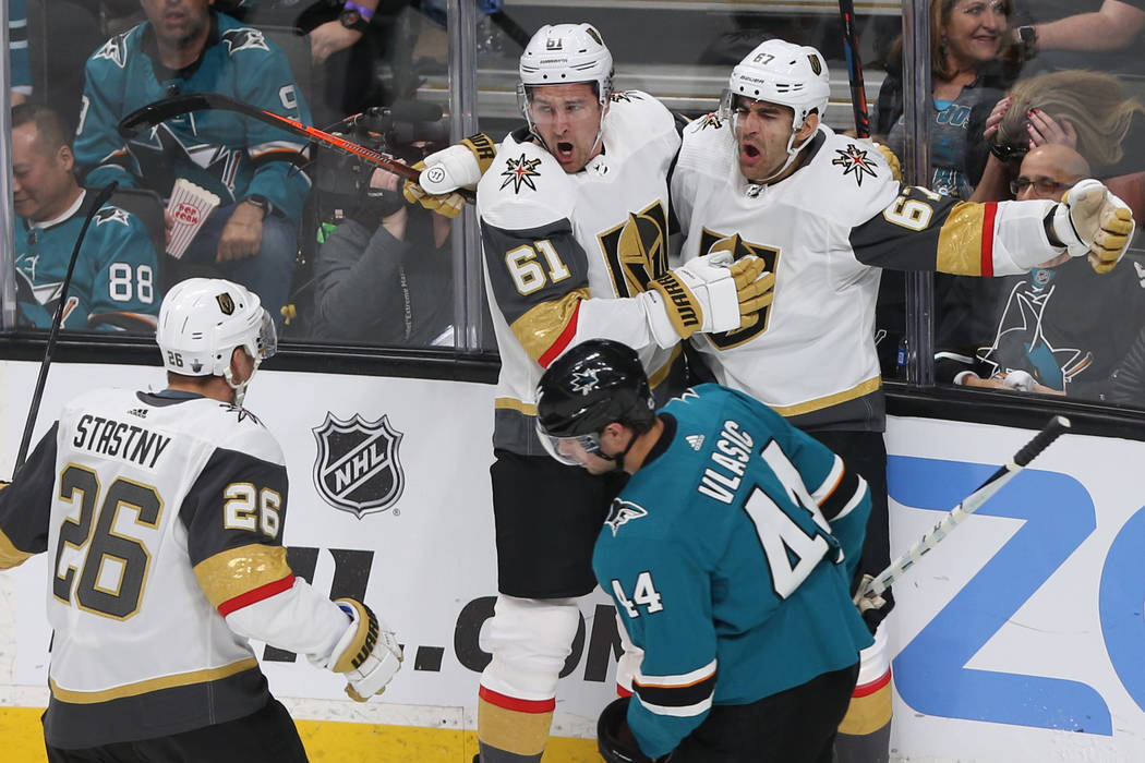 Golden Knights left wing Max Pacioretty (67) celebrates with teammates Mark Stone (61) and Paul ...