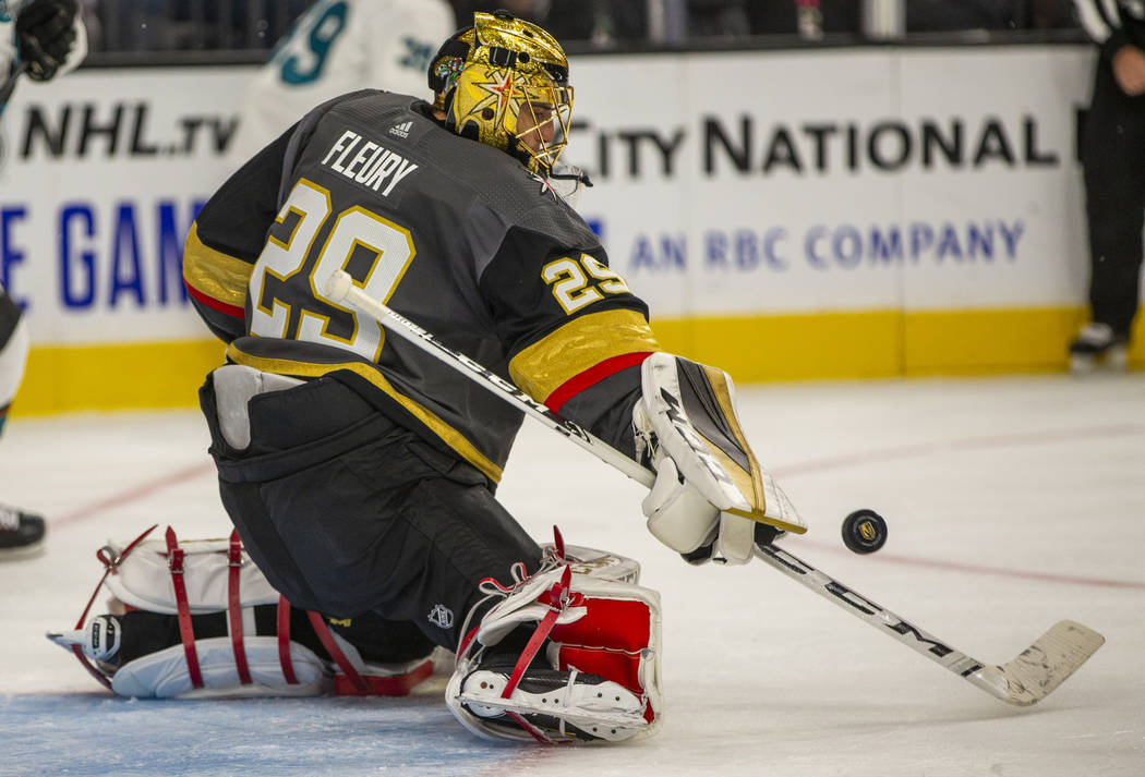 Vegas Golden Knights goaltender Marc-Andre Fleury (29) deflects a shot from the San Jose Sharks ...