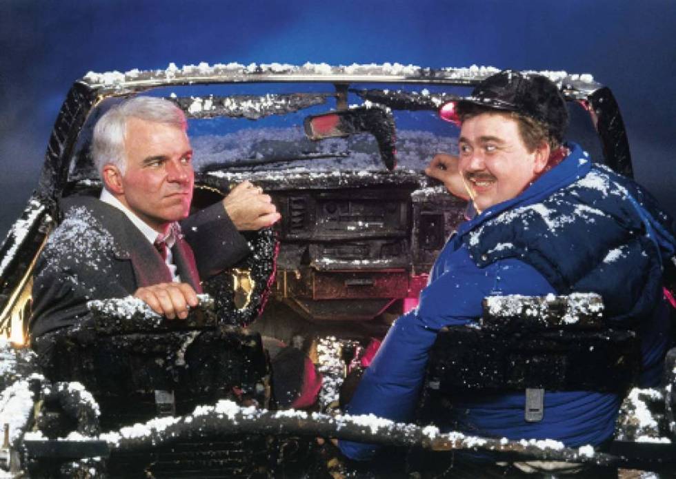 Steve Martin, left, and John Candy star in "Planes, Trains & Automobiles." © 1987 Paramount Pi ...