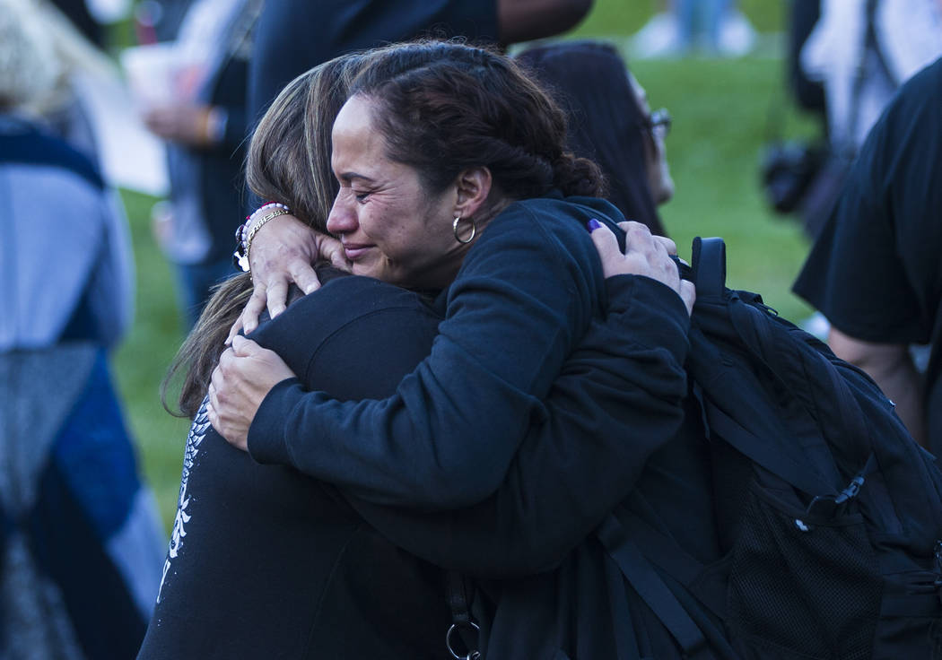 Route 91 Harvest festival shooting survivors Gloria Noble of Los Angeles, center right, and Con ...