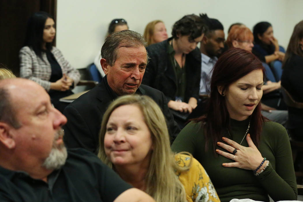 Rhonda Hawley, center, and her husband Aaron, the parents of Brooke Hawley, one of the teens ki ...